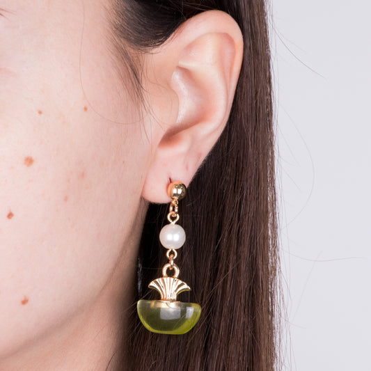 Metal earrings with green perfume