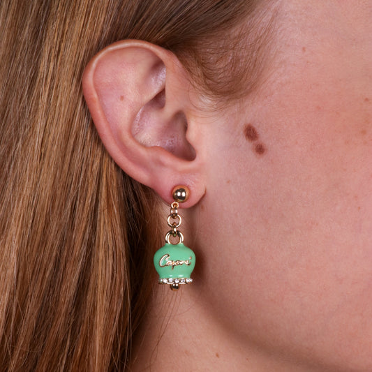 Metal earrings with green bell written Capri