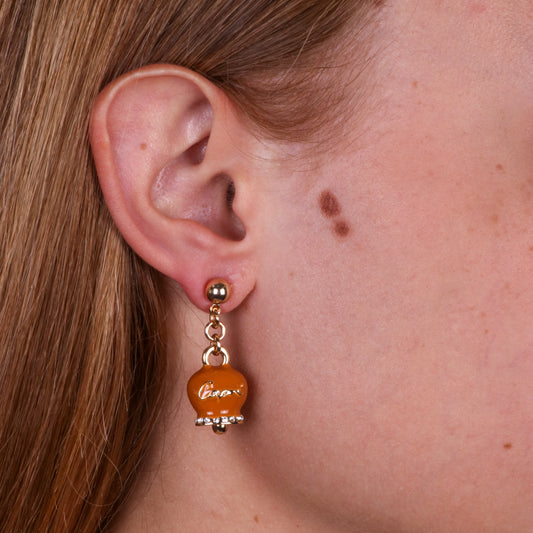 Metal earrings with orange bell written Capri