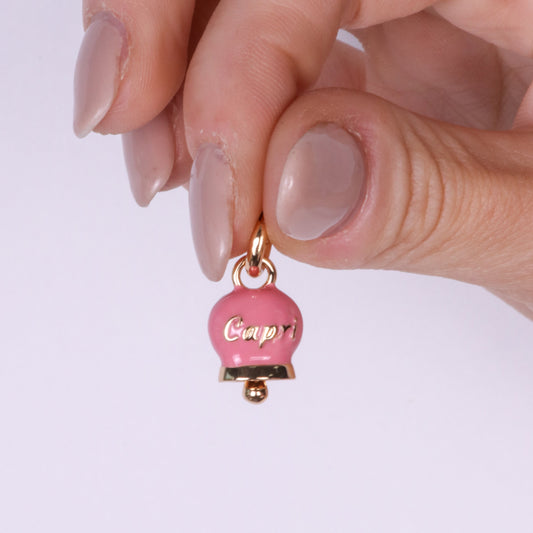 Metal pendant with pink bell written Capri