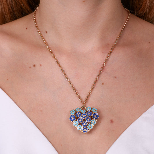 Heart metal necklace embellished with blue flowers