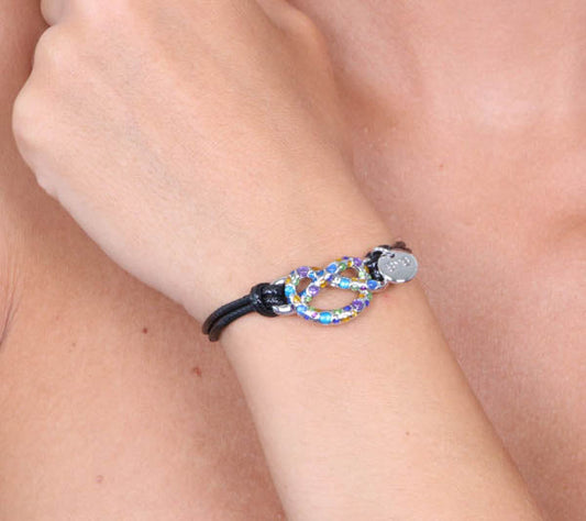 Bracciale in Metallo in caucciu, con simbolo infinito impreziosito da cristalli multicolore