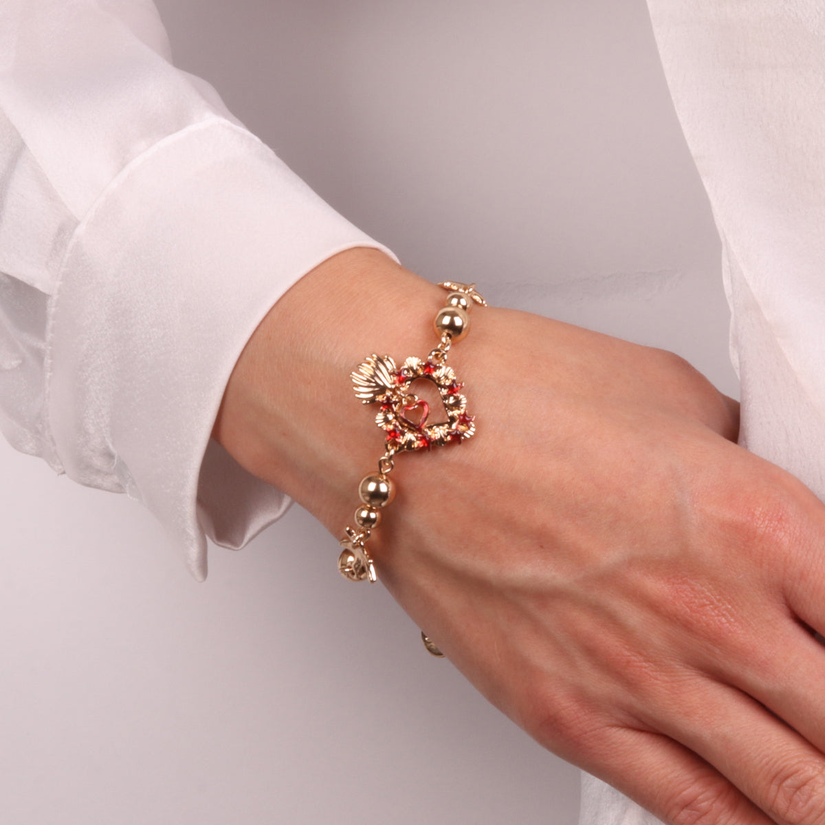 Bracciale in Metallo con cuore sacro e stelle