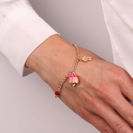 Bracciale in Metallo con campanella  rosa e fiocco centrale con pendenti a forma di bimba e cuore