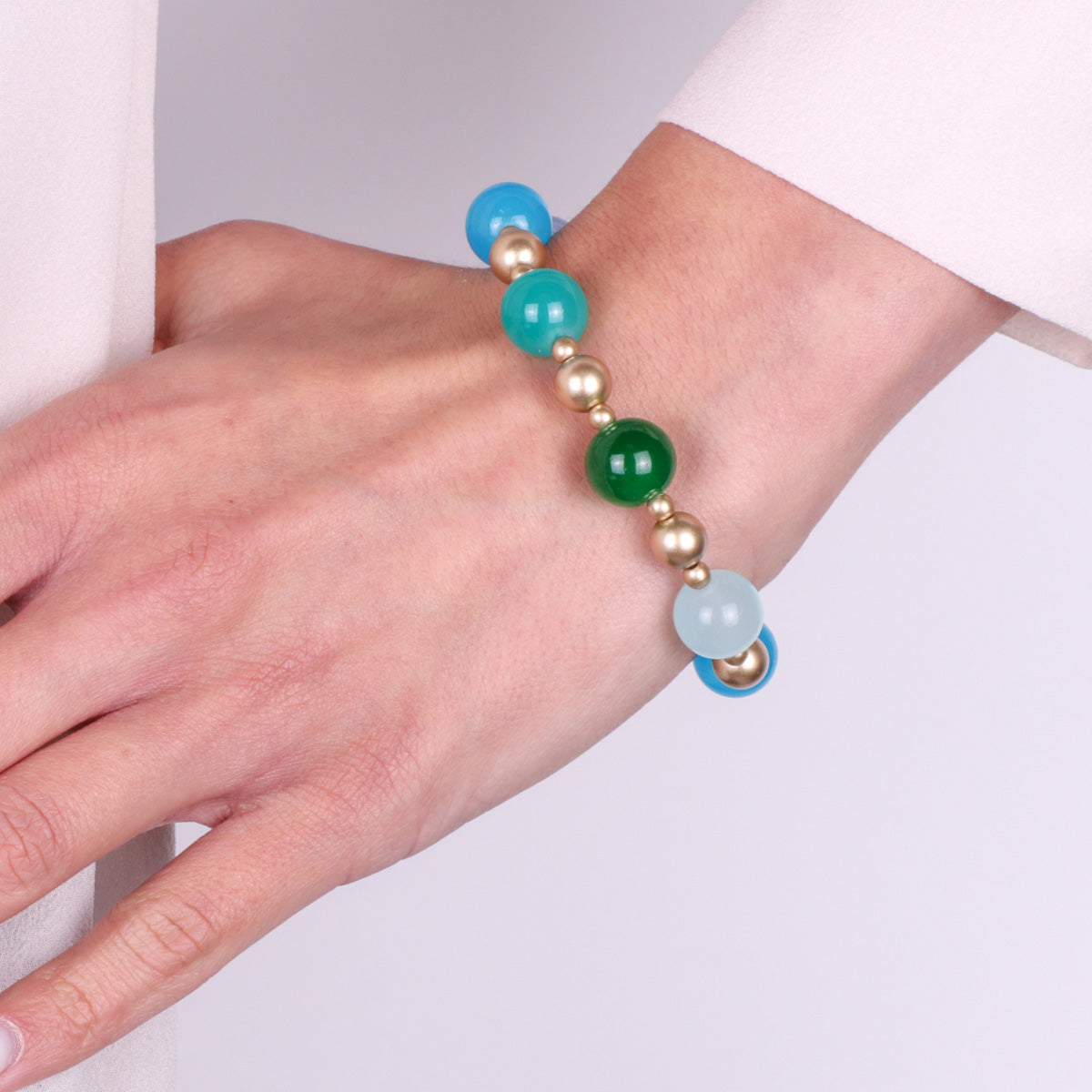 Bracciale in Metallo con cristalli blu e dettagli oro