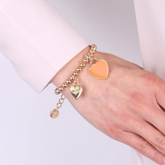 Bracciale in Metallo con cuore arancione pendente