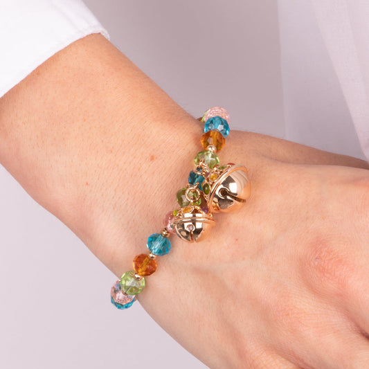 Metal bracelet with rattles and colored stones