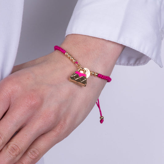 Bracciale in Metallo con cordino rosso e borsa rosa