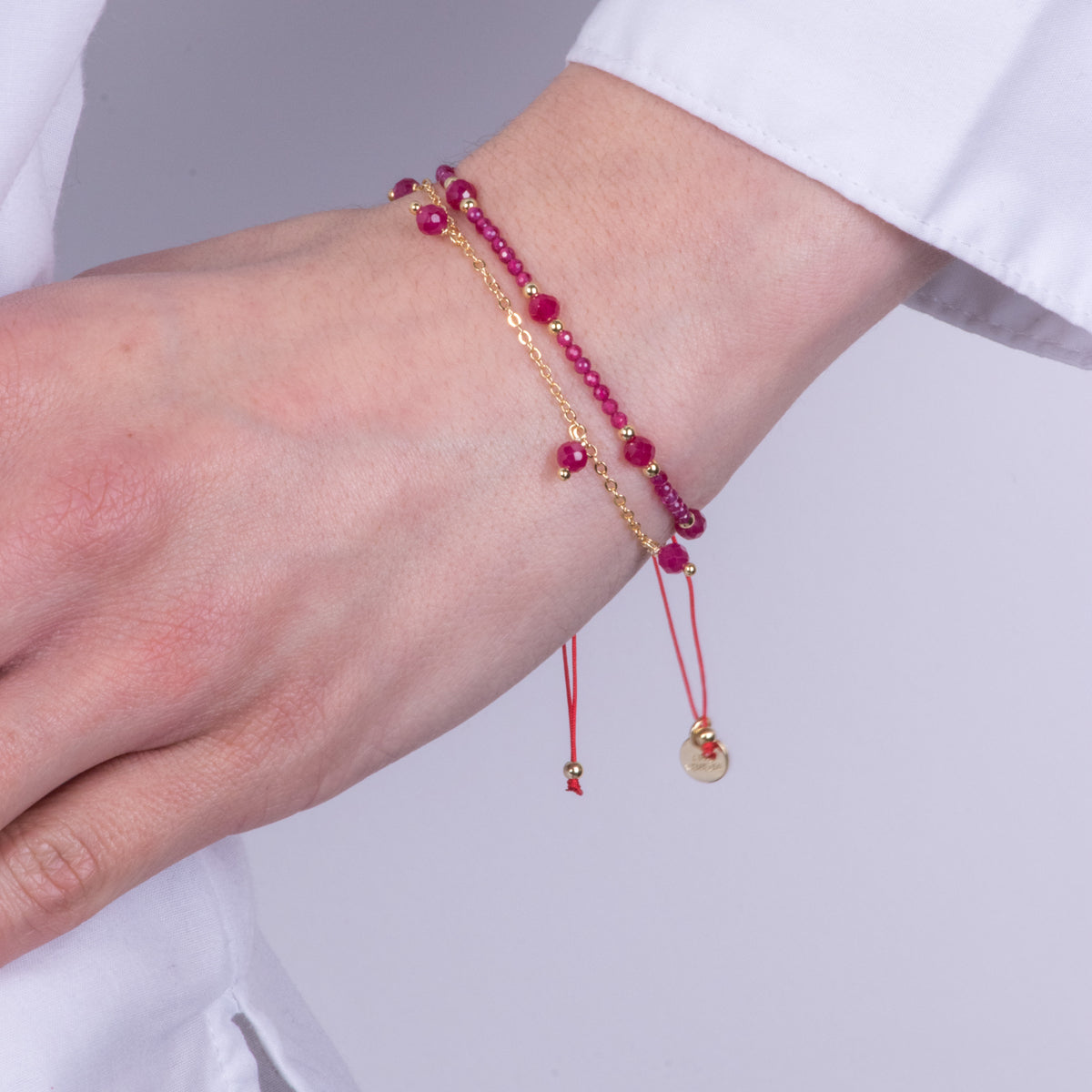 Bracciale in Metallo  cordino doppia catena con pietre rosse