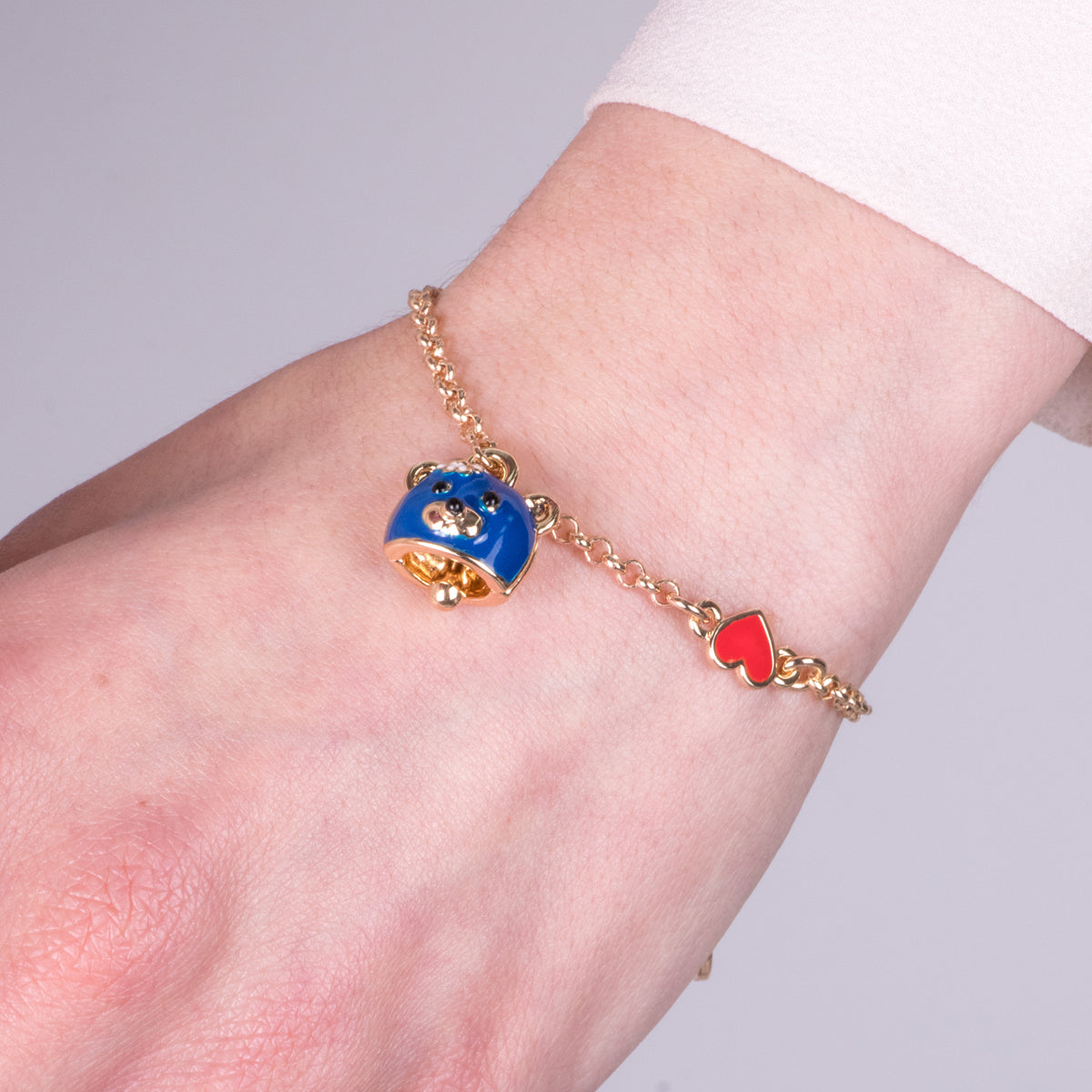 Bracciale in Metallo con campanella a forma di orso blu e cuore rosso