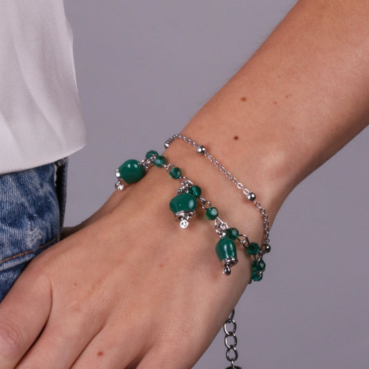 Metal bracelet with multi-strand green bells