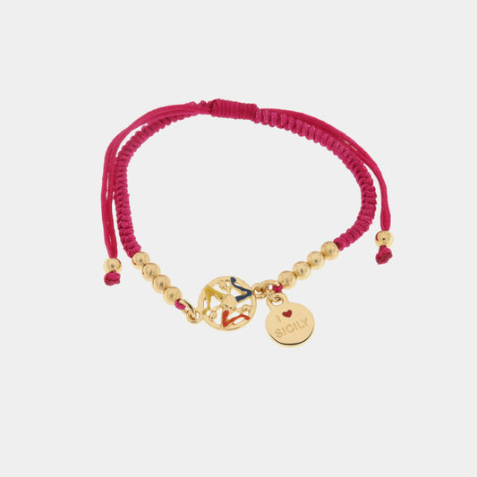 Bracciale in Metallo con cordino fucsia e trinacria